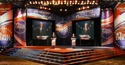 Kelsey Grammer and Dennis Hopper tailor their final presidential debate for the one voter who will cast the tie-breaking vote in SWING VOTE (2008), written by Joshua Michael Stern and Jason Richman.