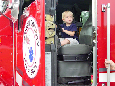 Gray in a fire truck