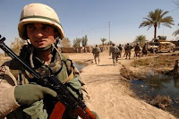 A soldier from the 13th Georgian Army Battalion provides security during a joint clearing operation with Iraqi troops in Ali Shaheen village, Iraq, last March.