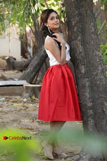 Actress Mahima Nambiar Latest Stills in White Top and Red Skirt at Kuttram 23 Movie Press Meet  0045.jpg