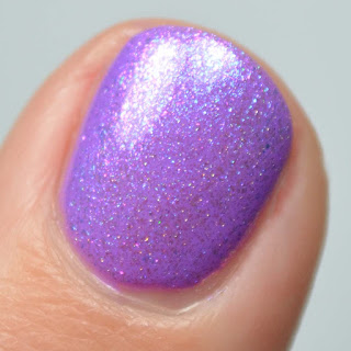 blue shimmer nail polish topper