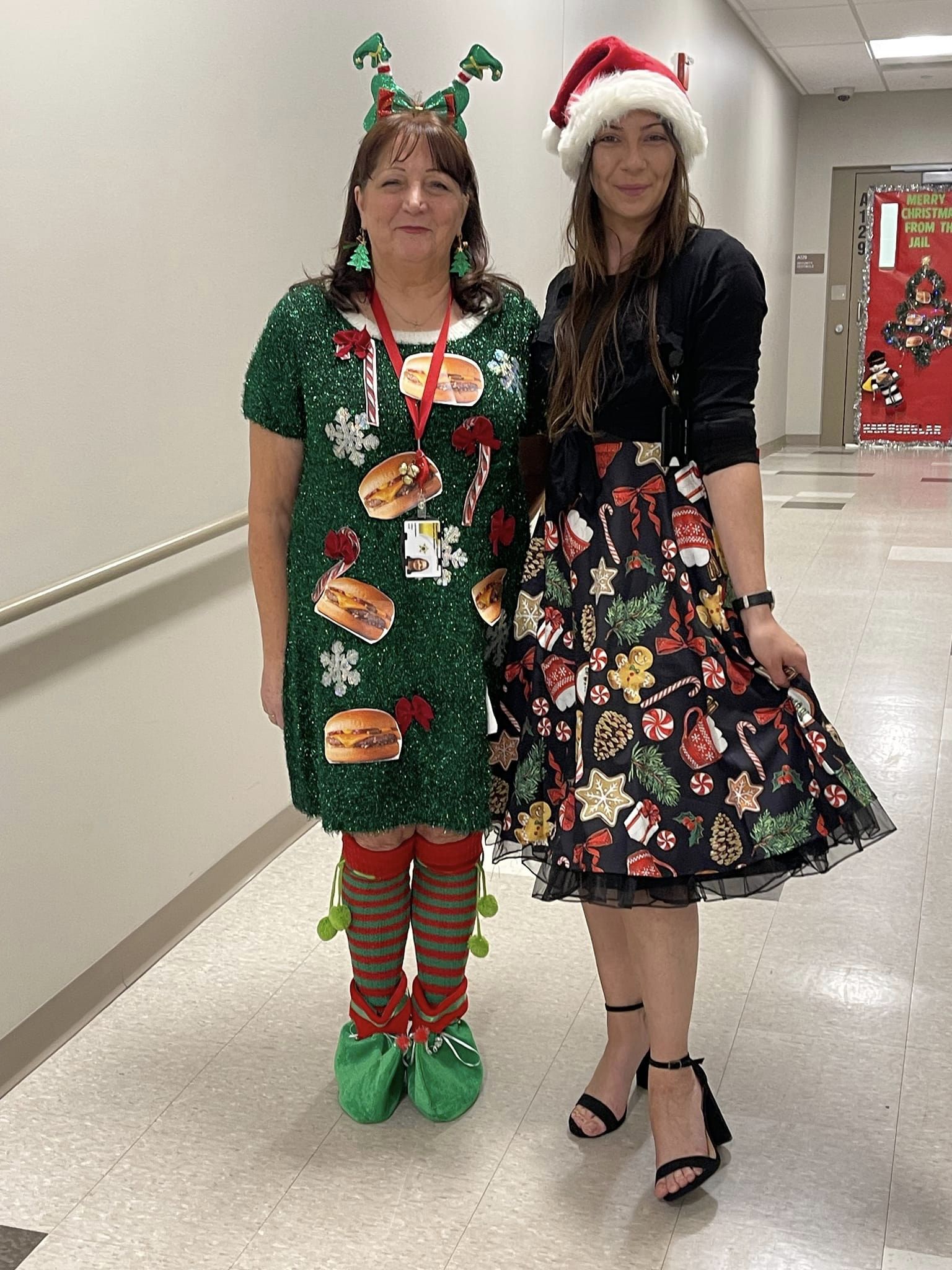 two women dressed for christmas