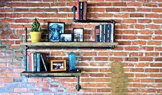 image: Industrial Pipe Bookshelves by Stella Blue Designs