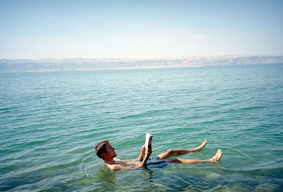 Tourist floating in the Dead Sea