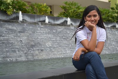 Taken with Nikon D3100. Water flowing on her background.