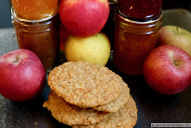 photo of apple butter muffin top cookies with apples and jars of jam