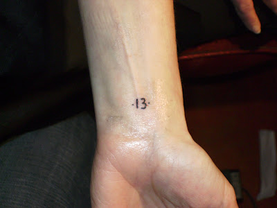 The final product is a cute little 13 on the inside of her left wrist