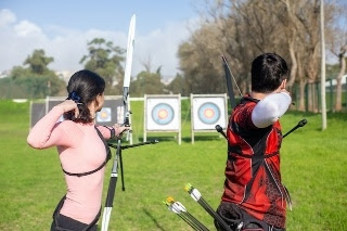 archers-aiming-on-an-archery-target