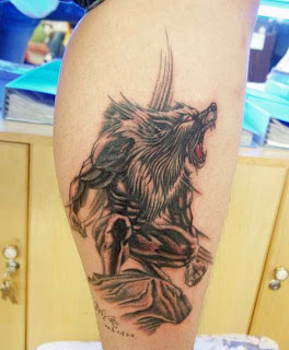 werewolf tattoo design on the leg