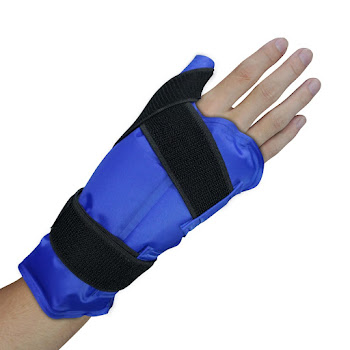 A Caucasian person's hand encased in a blue ice pack