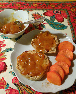 Plate of English Muffin with Persimmon Slices and Marmalade