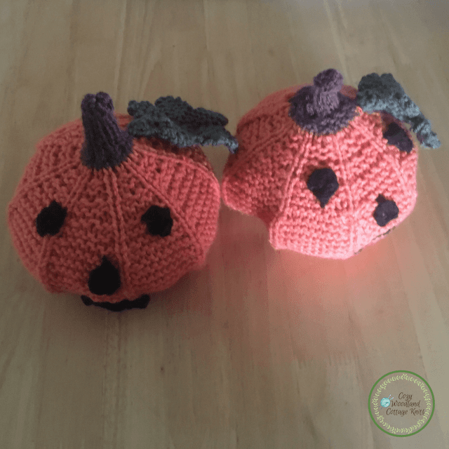 Picture of knitted spooky pumpkins together