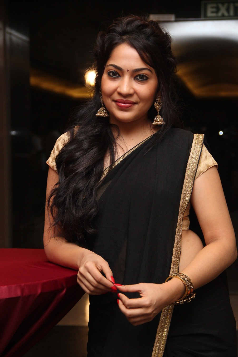 Vijay Tv VJ Ramya Spicy Stills In Black Transparent Saree 