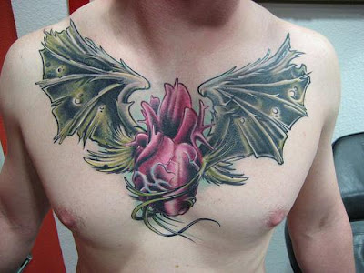 heart tattoos for men on chest. Chest tattoos for men and