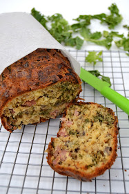 Quick bread made with cheddar cheese, bacon lardons, onions, kale, sriracha sauce baked into a loaf.