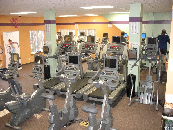 anytime fitness running man. Running on a treadmill gives