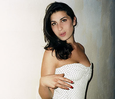 An early photo of Amy Winehouse before she started doing drugs and wearing 