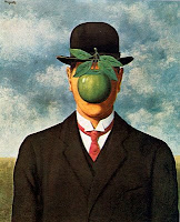 Well-dressed man with a green apple as his face