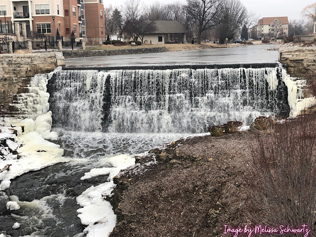 Winter framed waterfall at Leper Dam in Menomonee Falls.