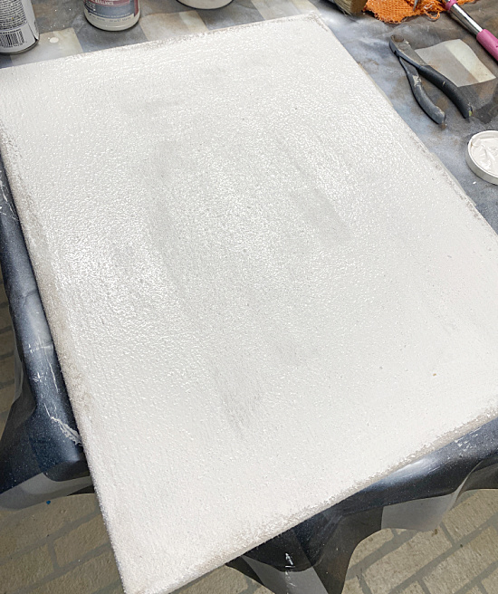 white painted fabric canvas