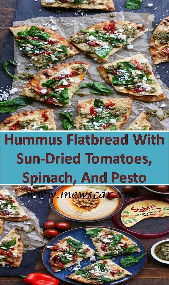 Hummus Flatbread With Sun-Dried Tomatoes, Spinach, And Pesto