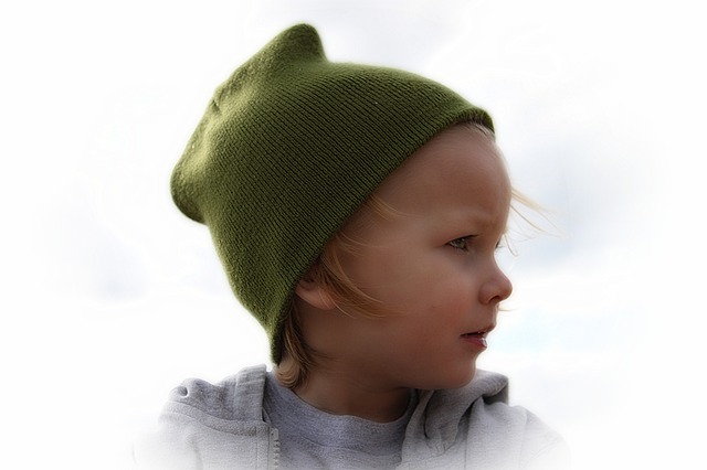 Image: Portrait of a baby boy in a green hat, by Greyerbaby / Lisa Runnels