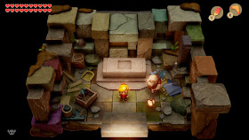 Link standing inside Dampe's Shack, wearing the Red Mail
