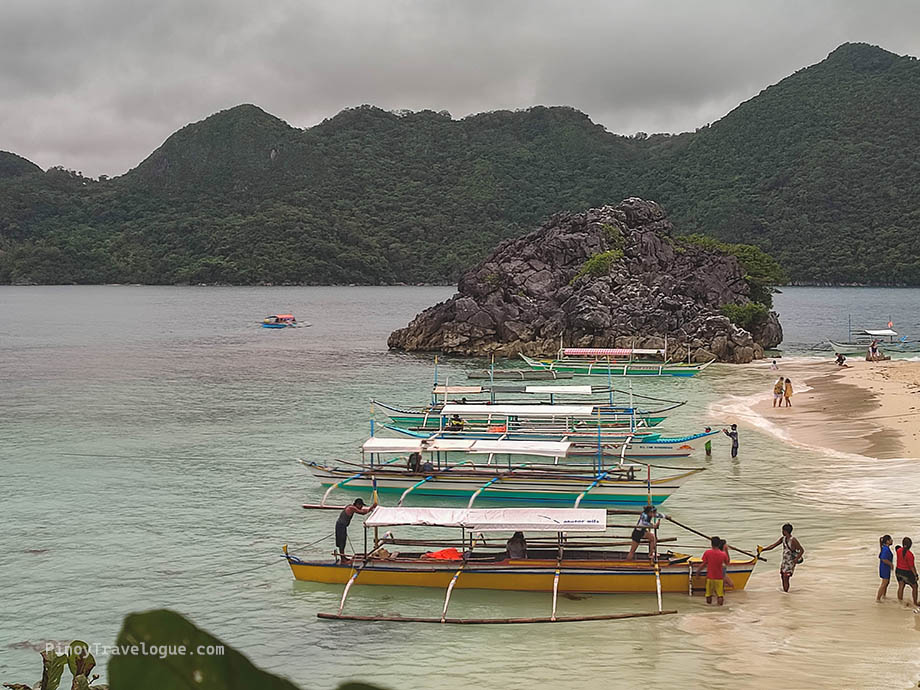 Island hopping boats parked at Matukad Island