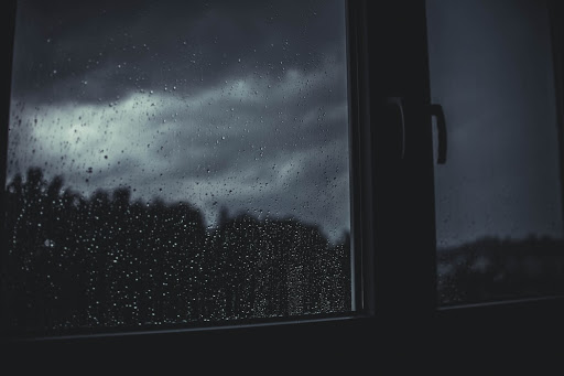 A window overlooking a rain storm