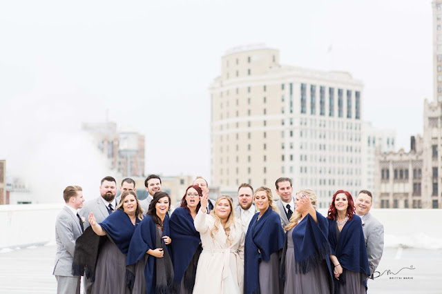 bridal party on z belt lot rooftop posing