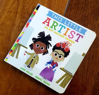 A photograph of the children's book "This Little Artist: An Art History Primer" by Joan Holub.