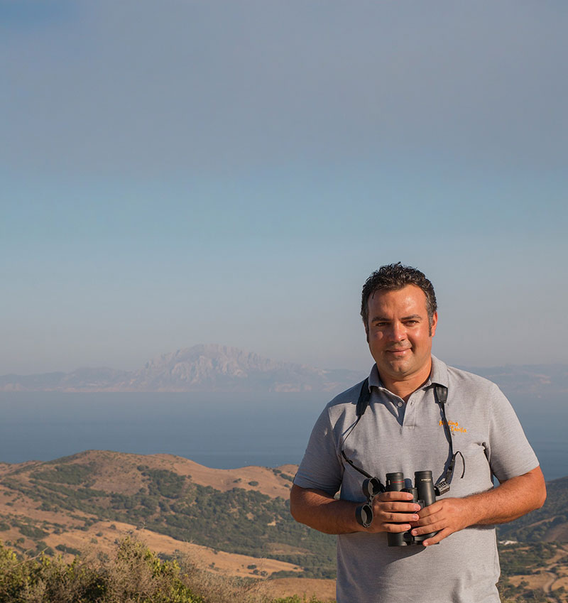 Manuel Morales of Birding Tarifa with the Strait of Gibraltar in the background