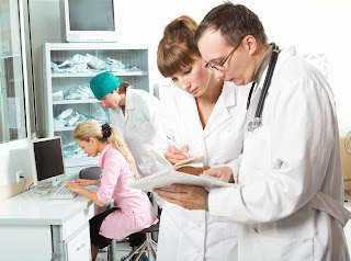 Image showing two people are discussing something about certain medical device