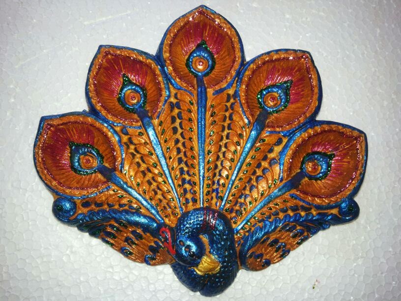 Single Hand Painted Peacock-shaped Diya Enriched With Glitter