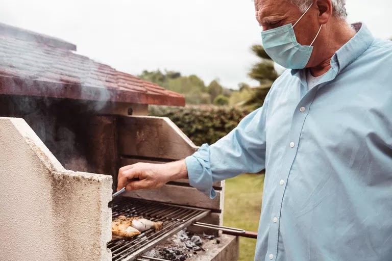 How to Safely Host a Gathering or Cookout, According to the CDC