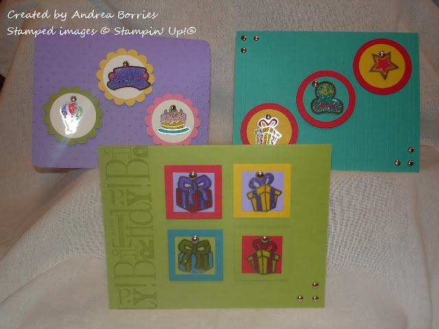 Three bright birthday cards featuring charms as the focal images.