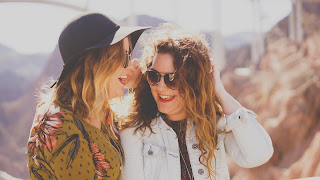 Two Female Platonic Friends Laughing Happily