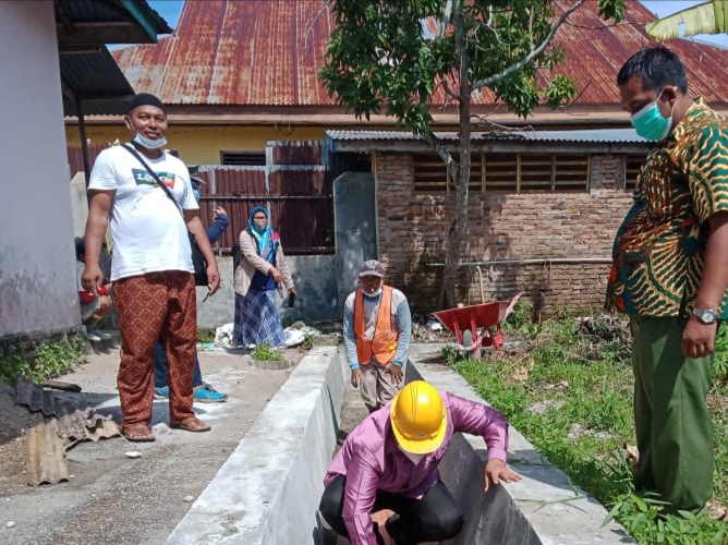 Wawako Mardison Mahyuddin Kunjungi Desa Rawang Tinjau Pengerjaan Padat Karya Melalui Program KOTAKU