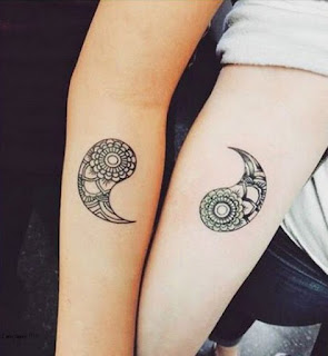 holding hands couple tattoos