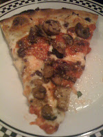 A slice of Anthony's Coal Fired Pizza