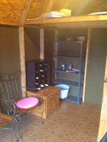 the barshed: shed into bar- moving in the furniture