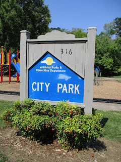 City Park in Salisbury NC - blue sign that has the name of the park and rules ©Katrena