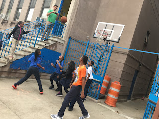Children play on 129th Street for recess at the Children's Storefront in Harlem.