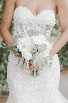 white bridal bouquet and pnina tornai wedding dress
