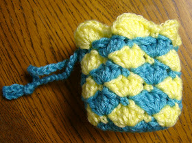Shell stitch crochet drawstring bag.