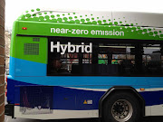 While I was gone, several of these hybrid buses were brought on line. (bus )