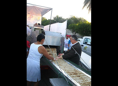 The largest burrito weighed 12,785.576 pounds and was achieved by CANIRAC La Paz