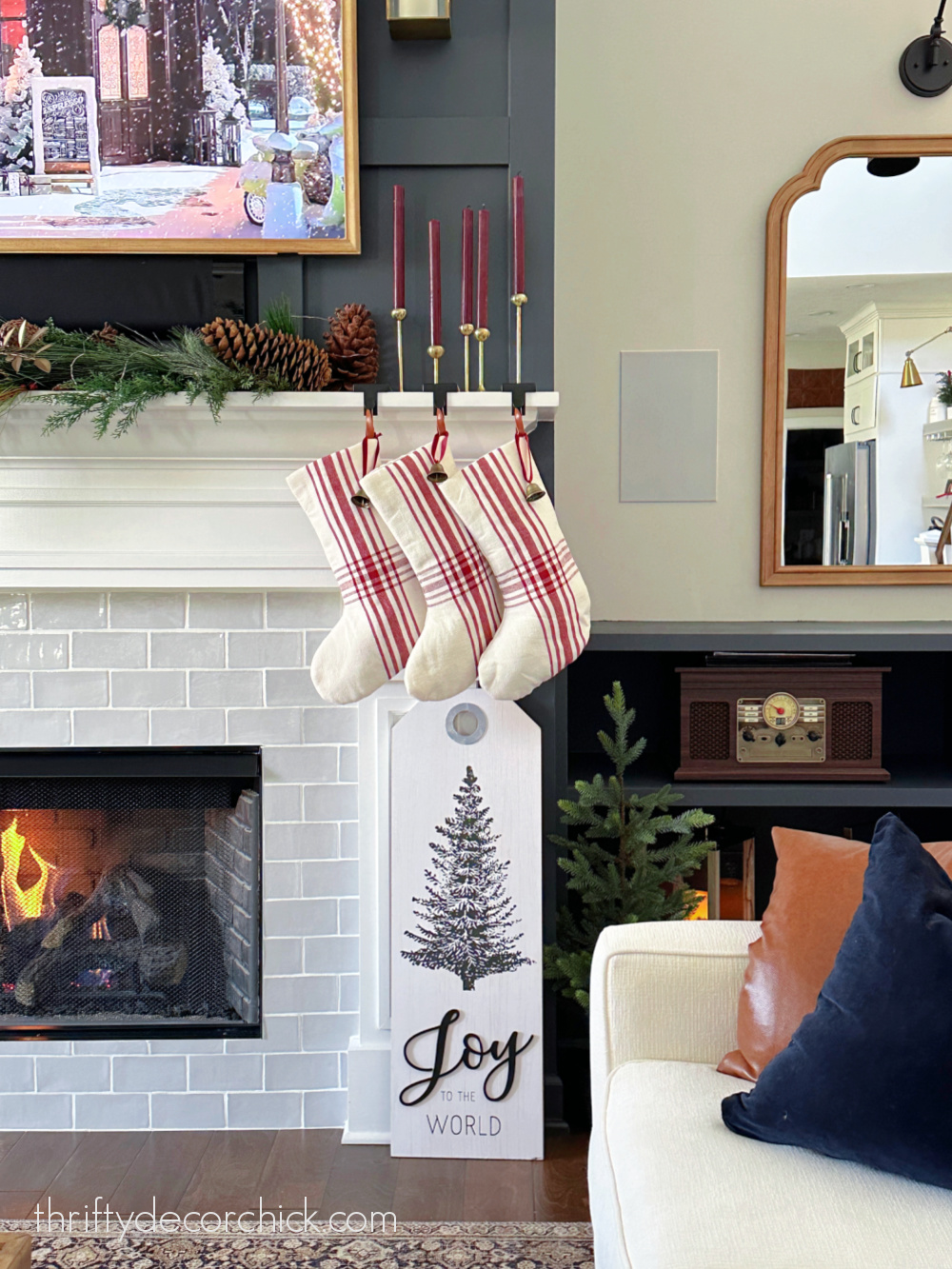 red and white stockings on mantel