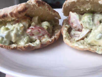 Close up of two filled pitta breads