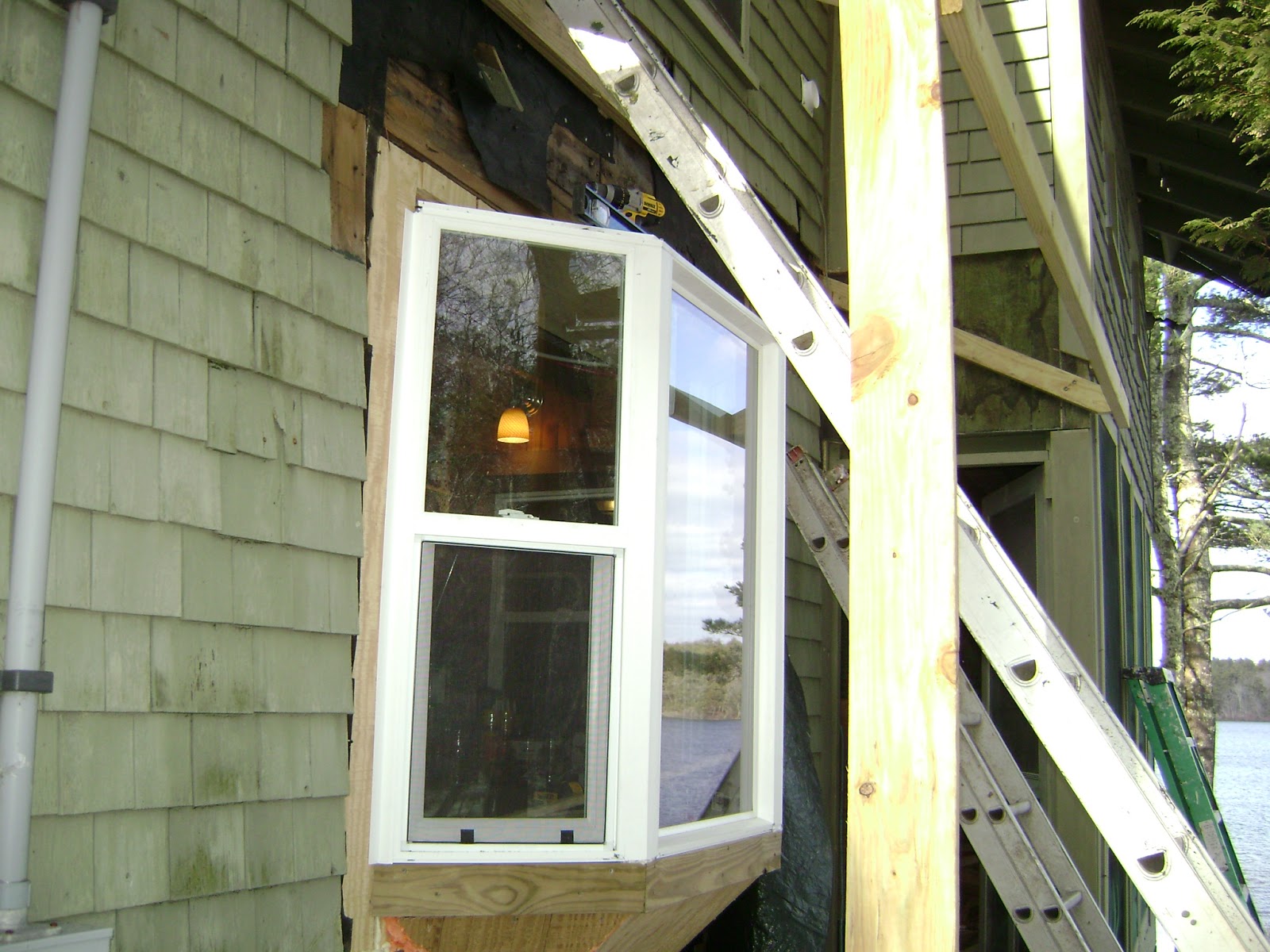 long pond endeavor company: bay window with new shed roof